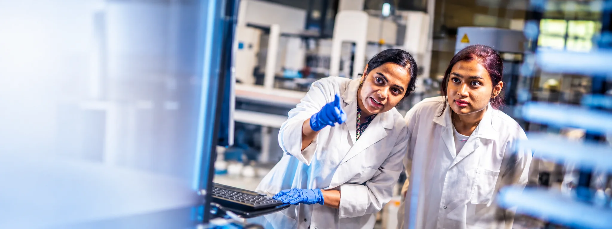 Concordia Genome Foundry scientists collaborating in modern automated laboratory